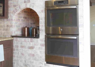 custom brick oven surround for kitchen remodel