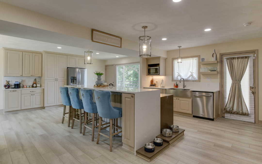 Open kitchen and living space created by removing a wall in a Hampton Roads home.